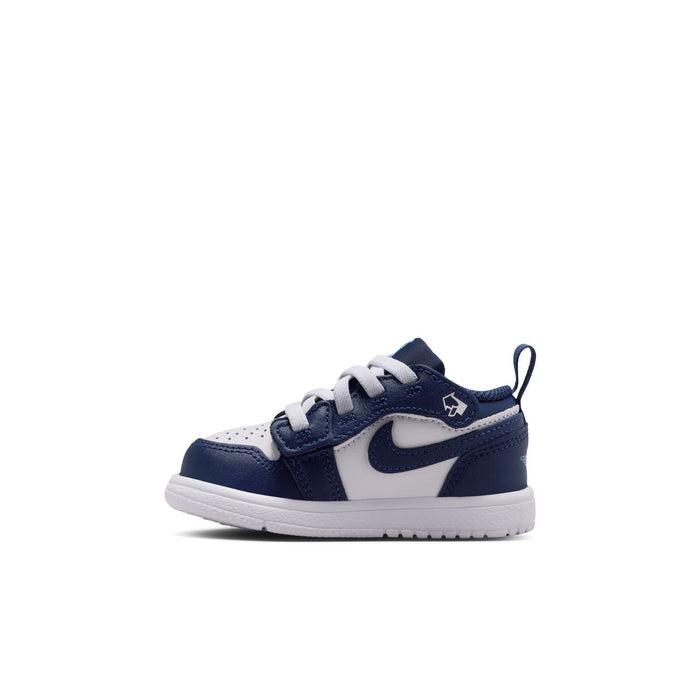 Toddler navy and white low-top sneakers with lace-up, Nike Swoosh, and white midsole