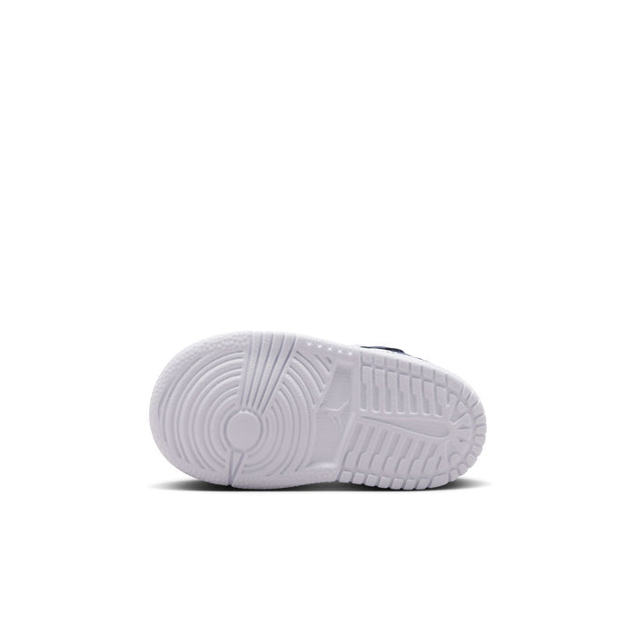 Toddler sneaker outsole with grippy tread and light-colored rubber sole