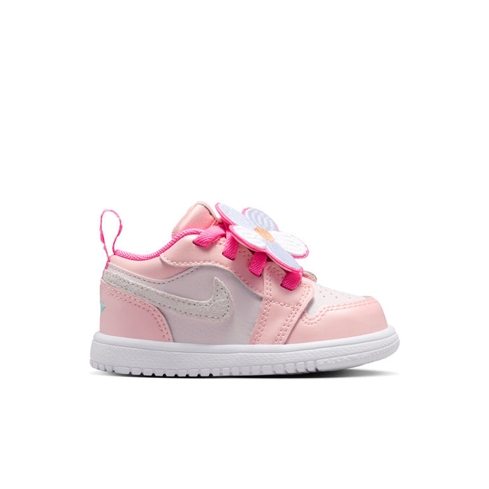 Pink toddler low-top sneakers with hook-and-loop straps and flower heel accents