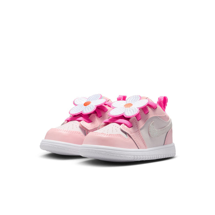 Pink toddler low-top sneakers with large flower applique on the side