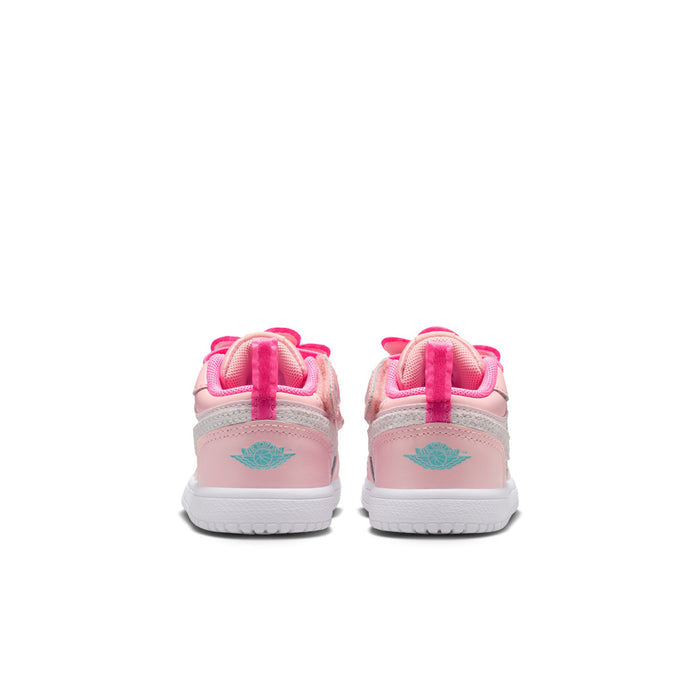Pink toddler low-top sneakers, back view, with teal bird patch and white sole