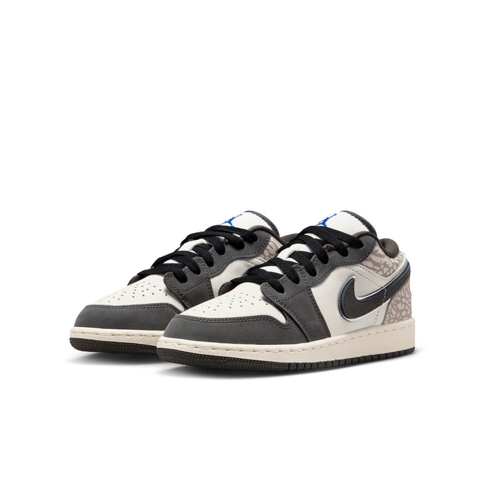 Youth Air Jordan 1 Low SE sneakers, side view; white upper with black swoosh