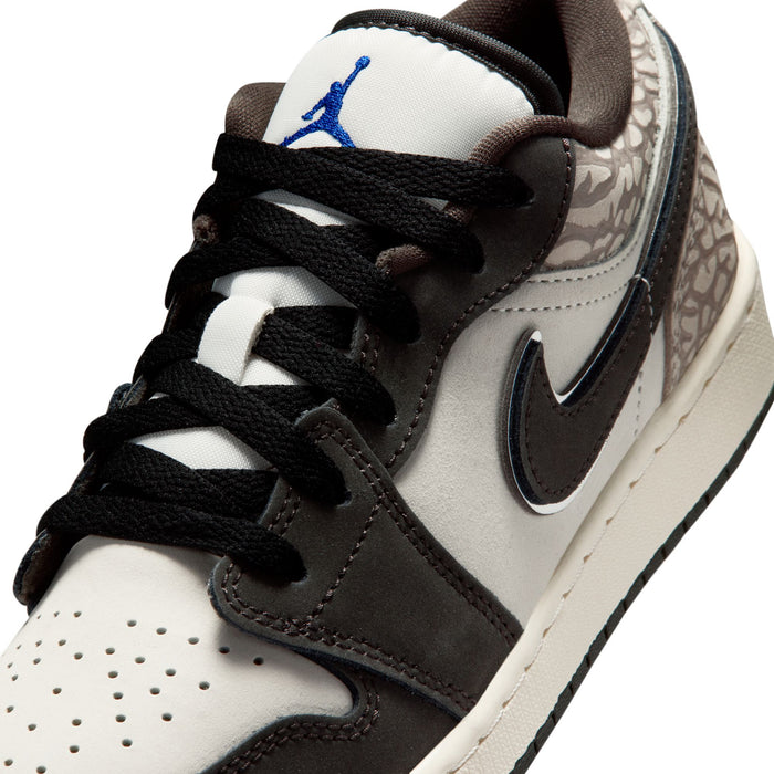 Youth Air Jordan 1 Low SE sneaker close-up; black laces, gray swoosh, patterned heel