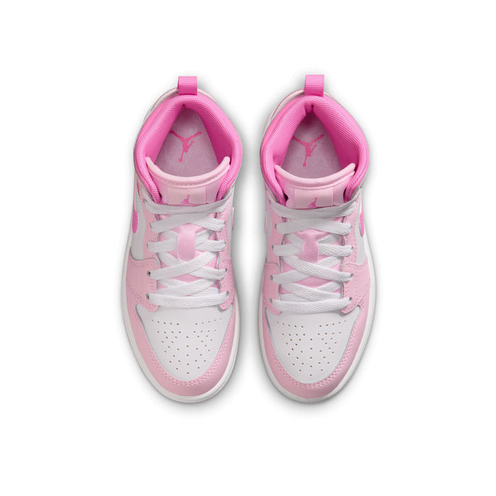 Kids' mid-top sneakers, top view with white laces and pink accents