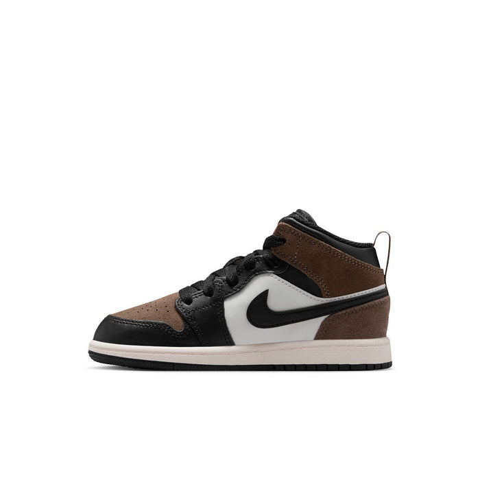 Kids mid-top sneakers with white swoosh, black laces, and brown collar