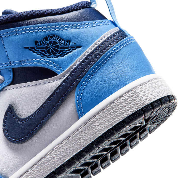 Kids mid-top sneaker close-up of side panel with Air Jordan wing emblem