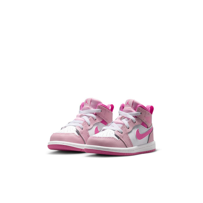 Pink and white toddler high-top sneakers with lace-up, padded collar, and swoosh