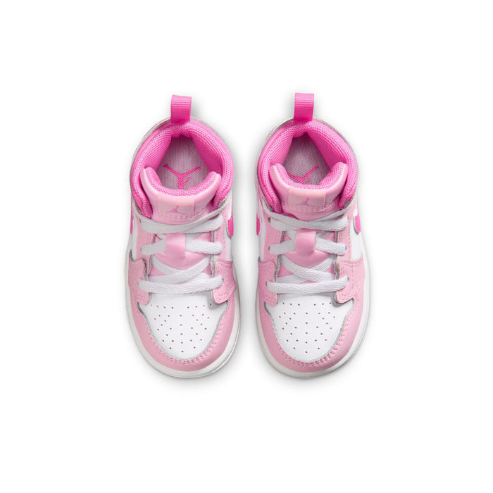 Pink and white toddler lace-up sneakers, front view with padded tongue and collar