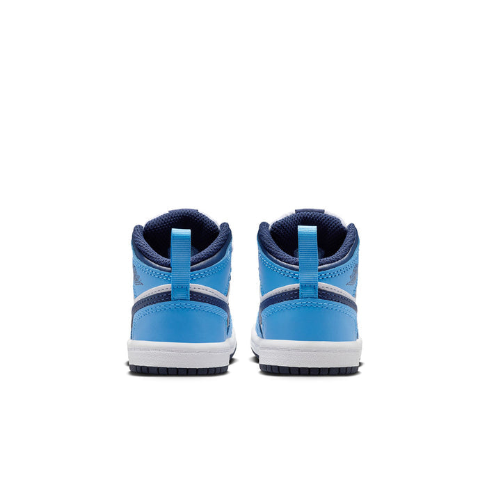 Toddler mid-top sneakers showing heel, light blue upper with dark navy collar