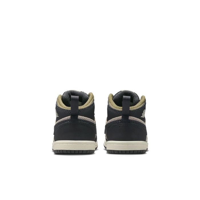 Toddler mid-top sneakers, back view showing black heel panels and off-white midsole