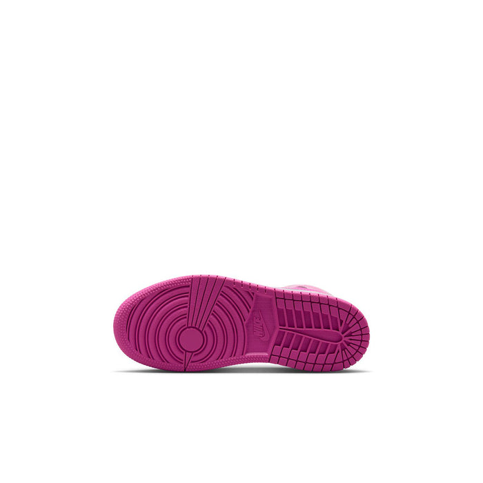 Pink and white toddler sneaker outsole with traction tread pattern