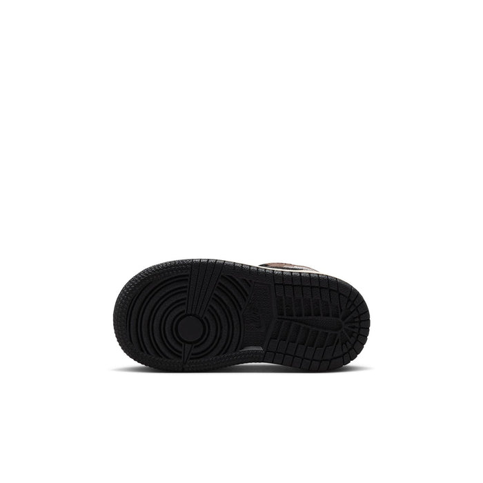 Toddler mid-top sneakers outsole with textured black rubber tread