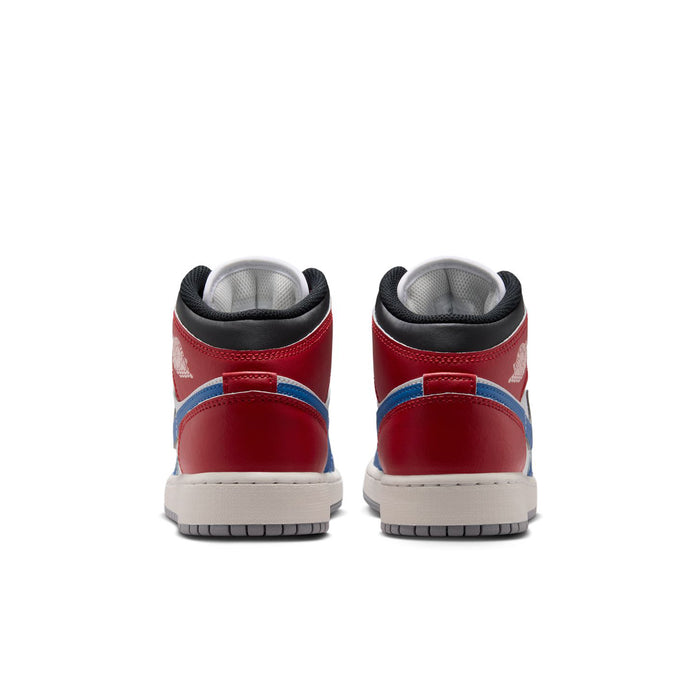 Youth Air Jordan 1 Mid sneakers heel view, red panels with black lining and white midsole.