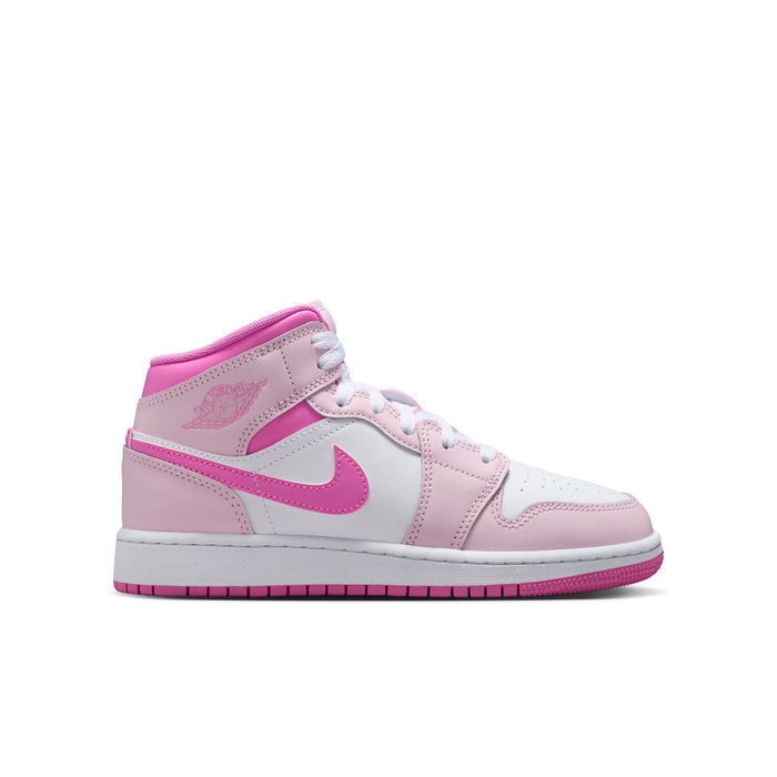 Youth mid-top sneakers in white and pink with pink Swoosh and lace-up design