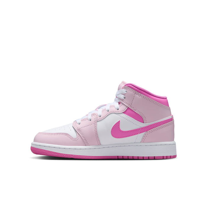 Youth mid-top sneakers with pink-and-white color blocking and Swoosh logo