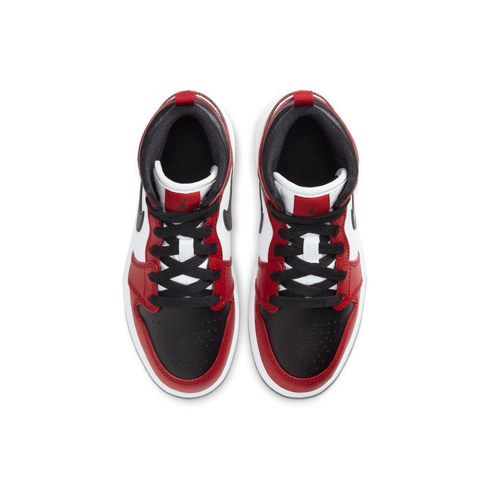 Kids sneakers with red-and-black uppers, black laces, and white lining visible