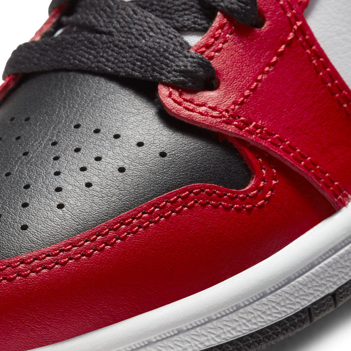 Kids red and black leather sneaker upper with perforations and stitched overlays
