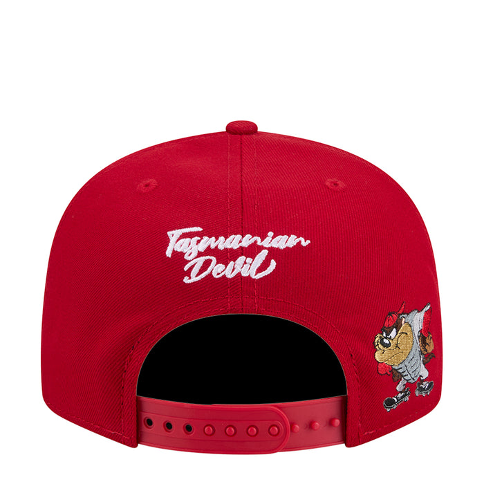 Red baseball cap with "Tazmanian Devil" script text and character graphic on side, open back