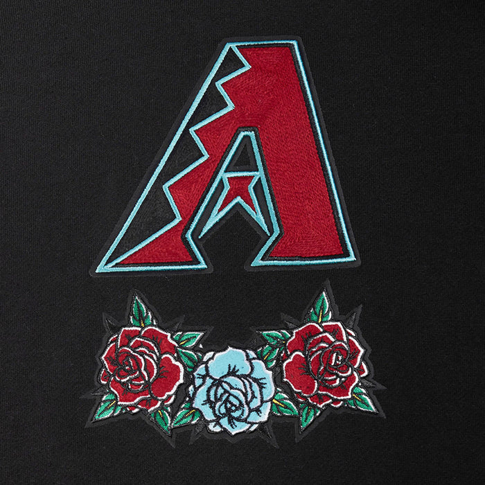 Close-up of embroidered Arizona A logo with red, teal outline, and rose flowers