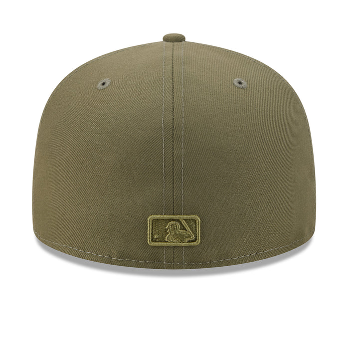 Olive baseball cap with small logo patch at back center