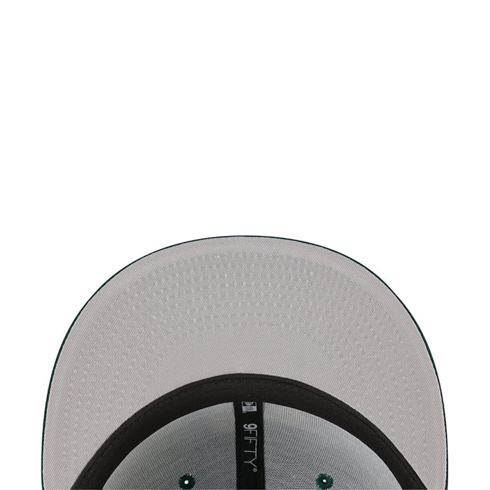 Green cap interior with grey brim underside and black inner band