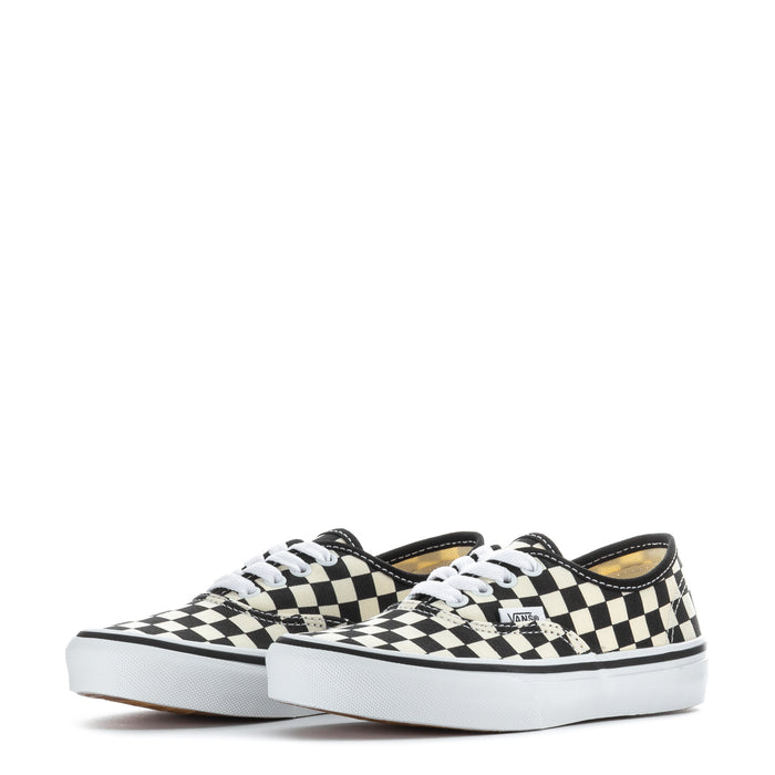 Kids low-top sneakers, front view in black and white checkerboard with white sole