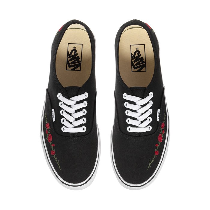 Men's black canvas sneakers front view with white laces and rose embroidery