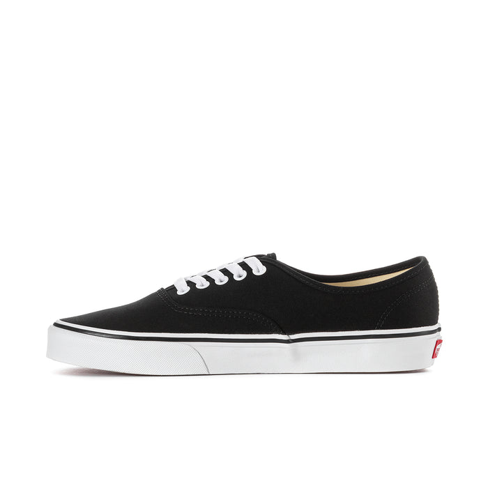 Men's black canvas sneakers side profile with rose embroidery and white sole