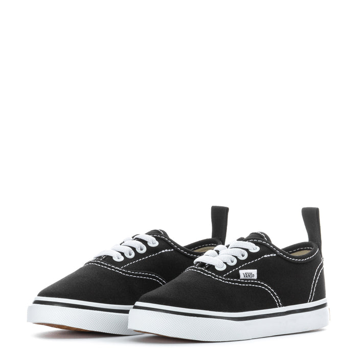 Pair of black toddler low-top lace-up sneakers with white laces and rubber sole