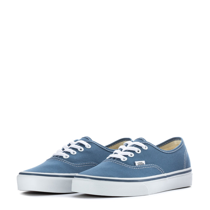 Pair of youth navy canvas low-top sneakers with white laces and VANS patch