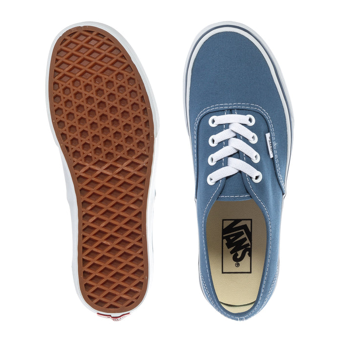 Youth navy canvas sneakers shown with gum outsole and VANS heel label