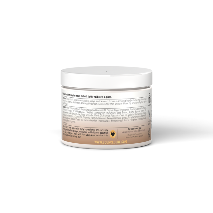 Bounce Curl hair‑care jar container with screw‑top lid on a light peach backdrop