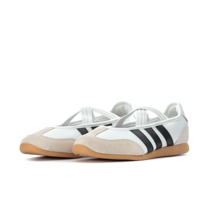Women's Mary Jane sneaker side view, white upper with black adidas stripes, gum sole