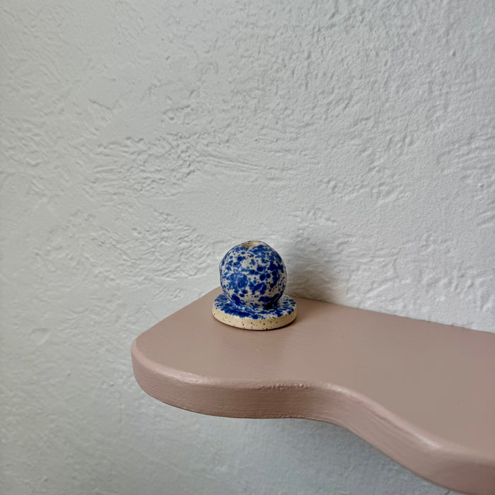 Blue speckled ceramic incense holder with dome sphere on flat base