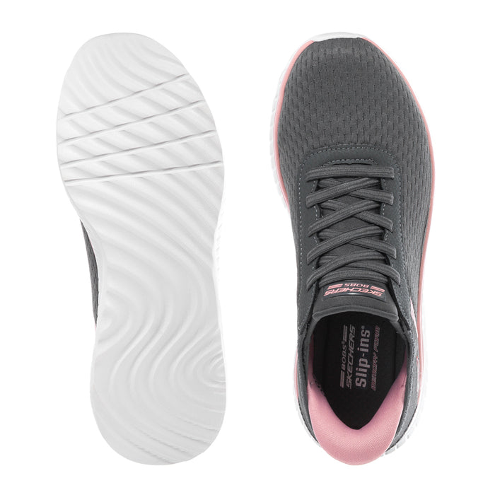Womens grey slip-in sneaker showing white outsole and dark interior with laces