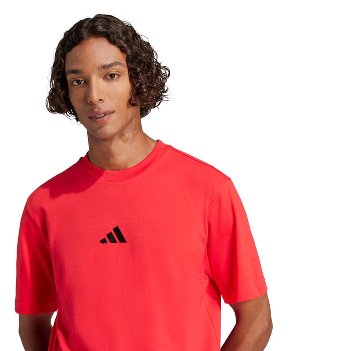 Men's red crew-neck T-shirt with small black logo on chest