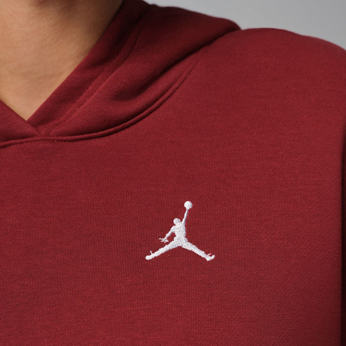 White Jordan logo on team red fleece pullover hoodie chest