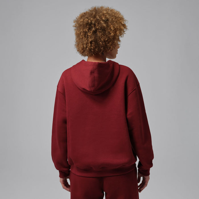 Team red fleece pullover hoodie, back view with hood and ribbed hem