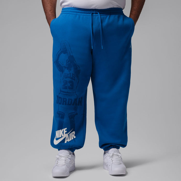 Men's blue cuff jogger pants with large back graphic and elastic waistband drawstring