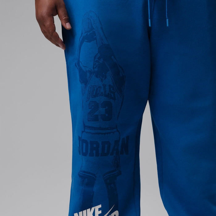 Men's blue cuff jogger pants with side graphic print and tapered leg cuffs