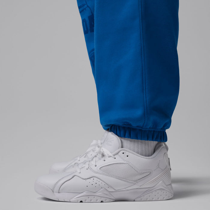 Men's blue cuff jogger pants with tapered legs and elastic ankle cuff detail
