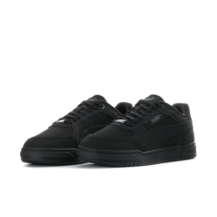 Men's black Puma low-top sneakers, side-by-side angled view, lace-up design