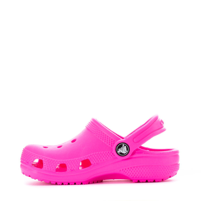 Bright pink toddler clog sandal with perforated upper and ridged outsole.