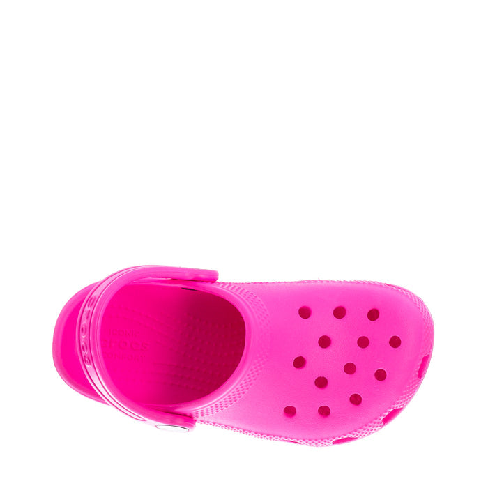 Bright pink toddler clog open heel showing perforated upper and logo badge.