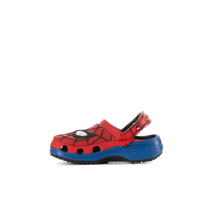 Toddler red spider-web clog side view with blue outsole and black heel strap