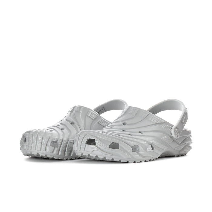 Men's white clog with ventilated holes, molded top, and adjustable heel strap