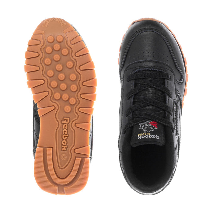 Black toddler sneaker outsole and inner lining view with gum tread