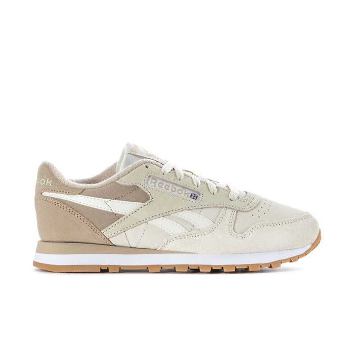 Women's cream sneakers with tan suede panels, white side stripes, lace-up