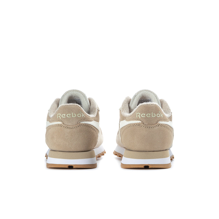 Women's cream sneakers with tan heel tab and gum sole, rear branding