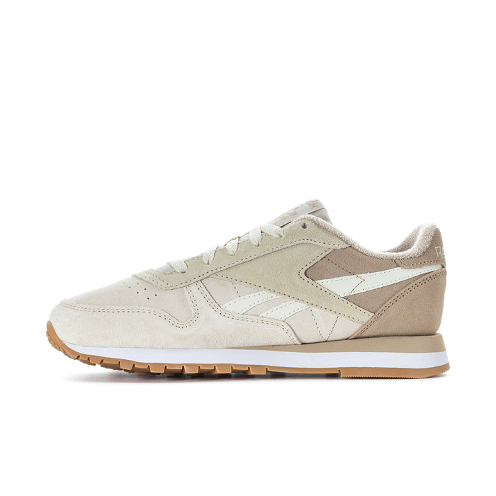 Women's cream sneakers with tan overlays, white midsole stripe, lace-up